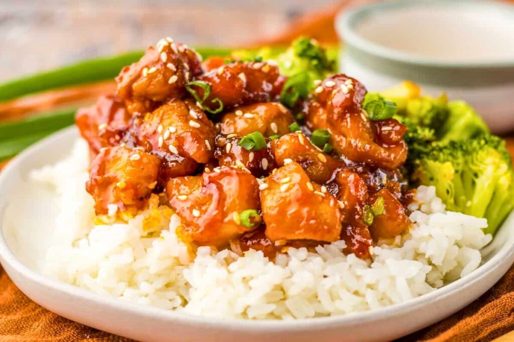 Food Court Bourbon Chicken topped on rice.