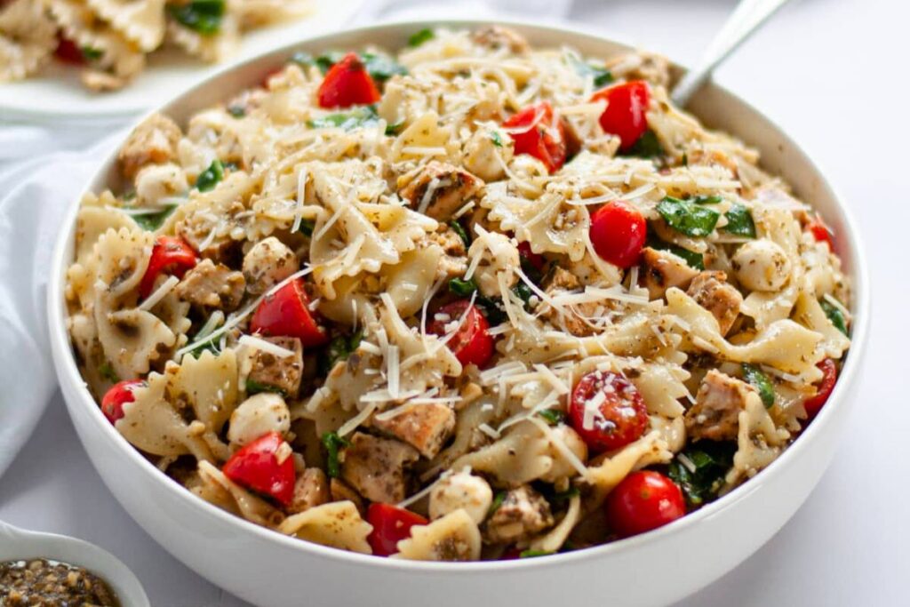 Pesto Pasta Salad with Chicken in a bowl.